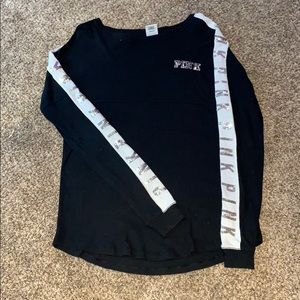 a black long sleeved PINK tee shirt